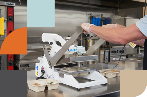Solpak tray sealer in a professional kitchen